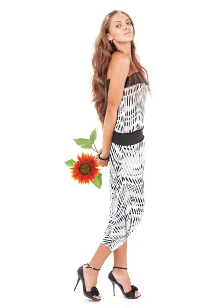Young beautiful lady in harem pants with sunflower full-length s — Stock Photo, Image
