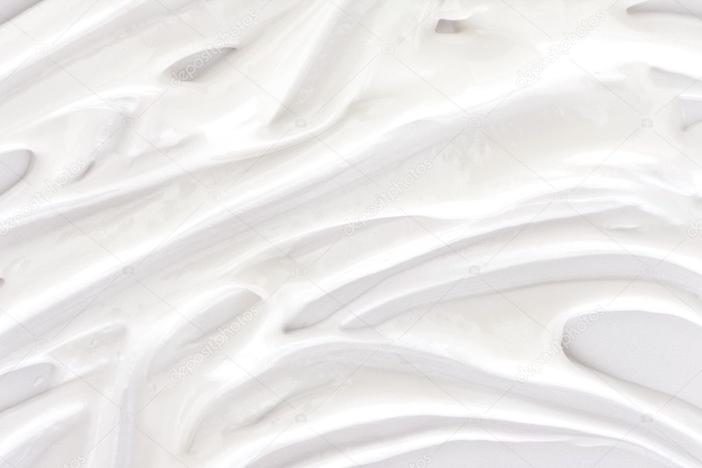 Light face cream samples on white