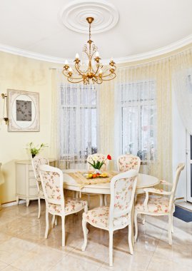 Classic style dining room interior in beige pastoral colors clipart