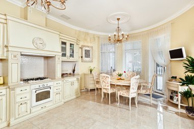 Classic style kitchen and dining room interior in beige pastoral colors clipart