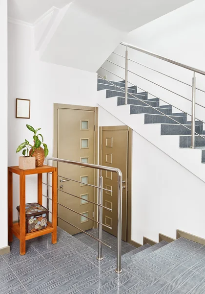 Modern hall with metal staircase interior in minimalism style — Stock Photo, Image