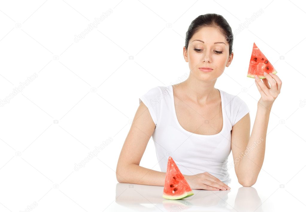 Young attractive woman with water melon isolated on white