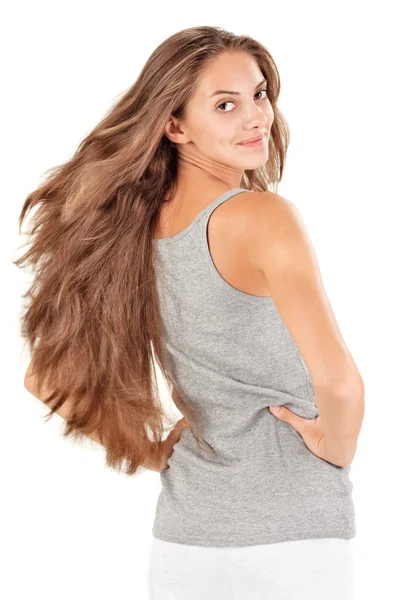 Jovem mulher bonita com cabelos longos voadores — Fotografia de Stock