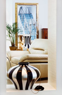 Part of modern art deco style drawing-room interior with striped vase. Shot is made with tilt-and-shift lens and has diagonal focus plane and extremely shallow clipart