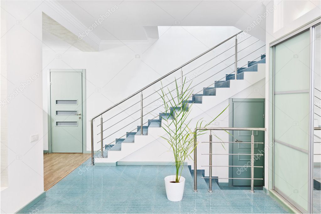 Part of modern hall interior with metal staircase in minimalism style