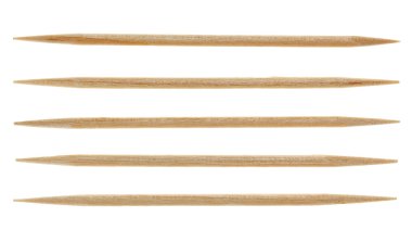 Five single toothpicks, isolated on white clipart