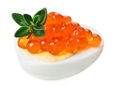 Red caviar canape with quail egg and thyme twig clipart