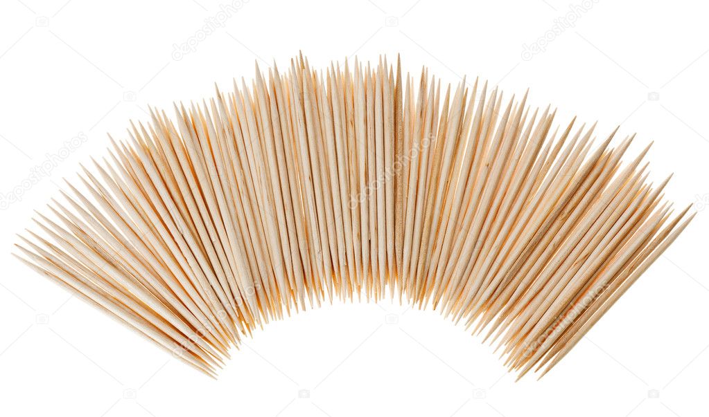 Many scattered toothpicks in semicircle shape, isolated on white