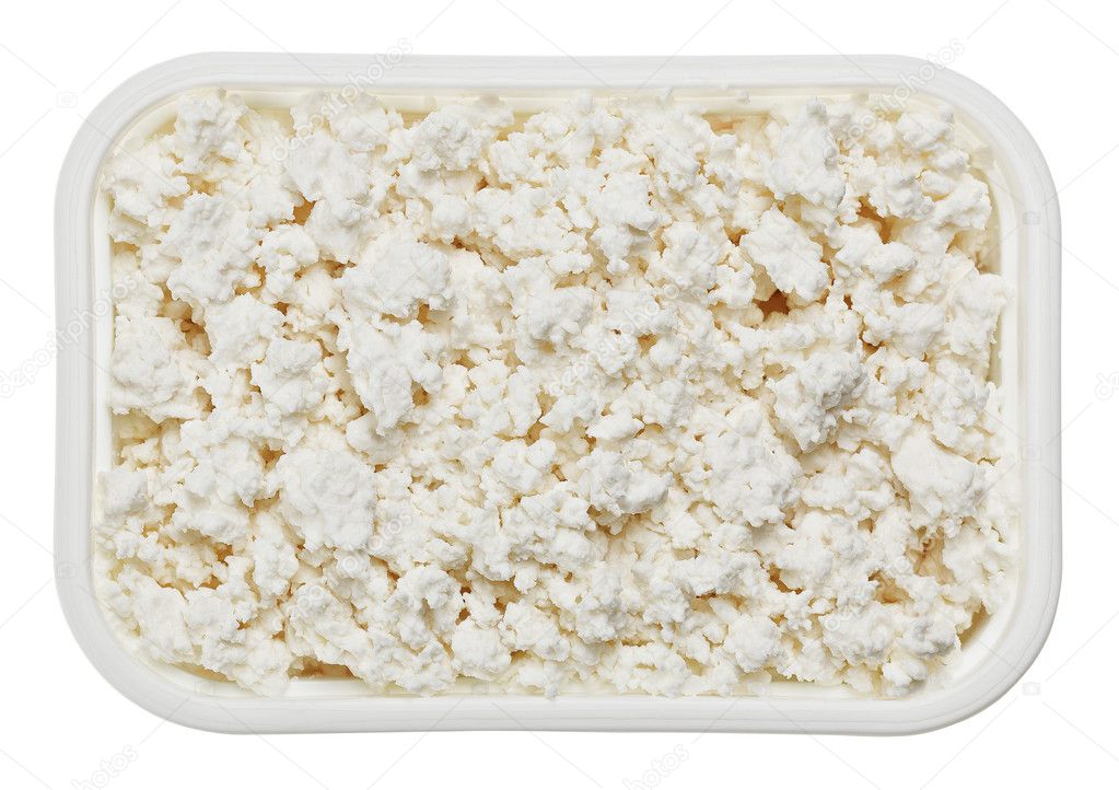 Cottage cheese (curd) in small square plate, isolated on white