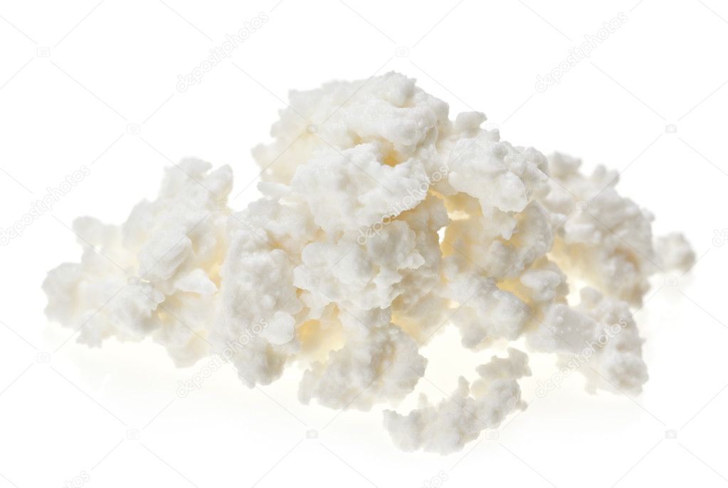Cottage cheese curd heap, isolated on white