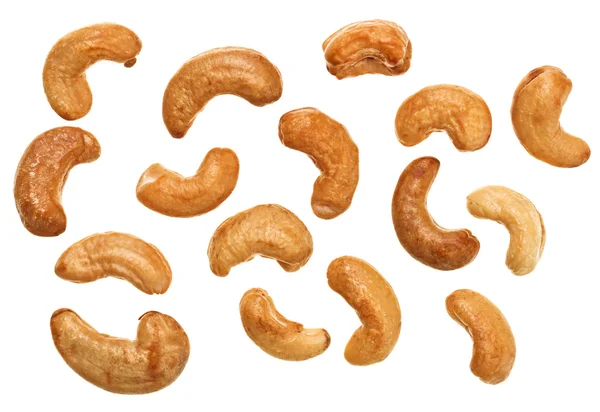 Unshelled geroosterde cashewnoten voedsel achtergrond — Stockfoto