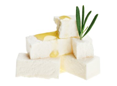 Feta cheese cubes with rosemary twig and oil drops clipart