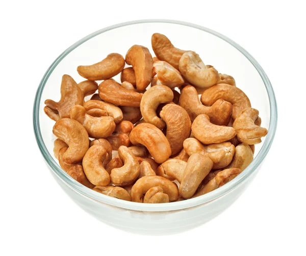 Unshelled cashew nuts in a glass bowl — Stock Photo, Image