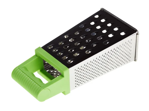 Multi purpose stainless steel grater with green plastic handle — Stock Photo, Image