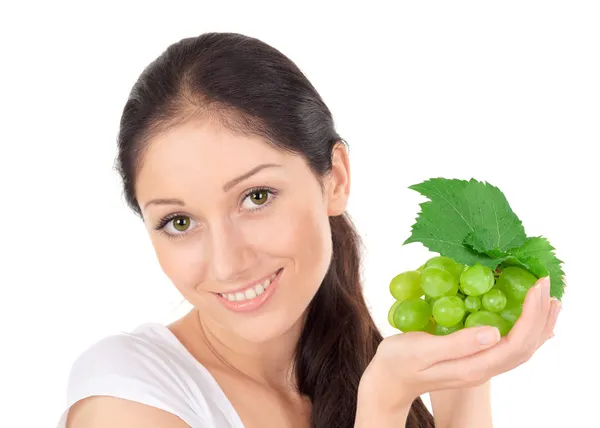 Ung attraktiv dam med gröna druvor kluster — Stockfoto