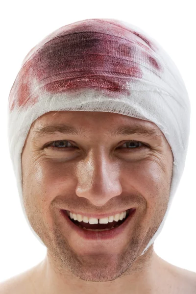 Наложение повязки на голову раны крови — стоковое фото