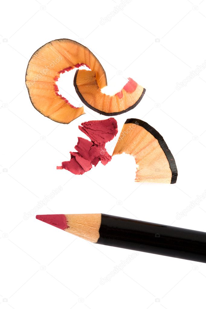 Pencil cosmetic sharpening with husk on white
