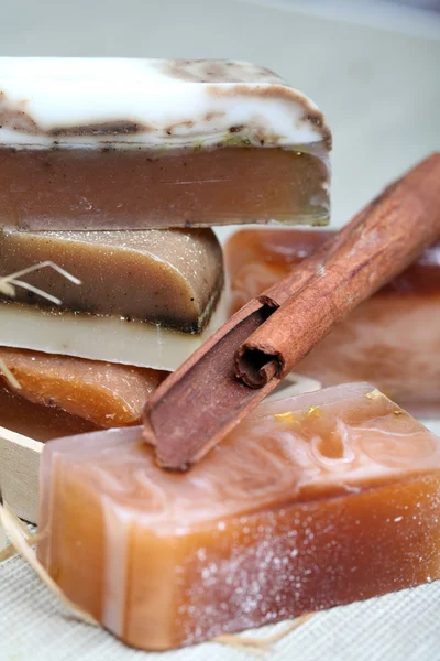 Handmade soap and sinnamon sticks spa composition — Stock Photo, Image