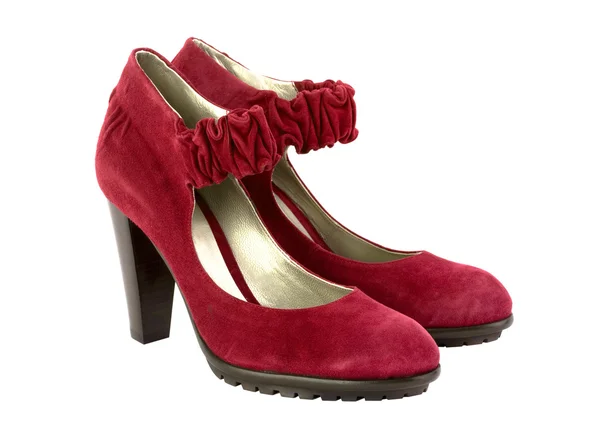 Красные женщины замшевые туфли на высоком каблуке — стоковое фото
