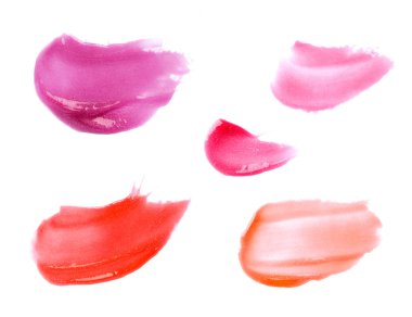 Smudged lipgloss or lipstick samples isolated on white clipart