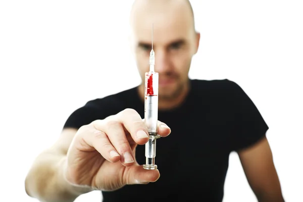 Muž s injekční stříkačkou — Stock fotografie