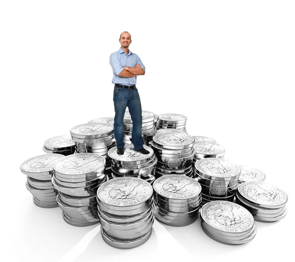 Muž stojící na mince dolaru — Stock fotografie