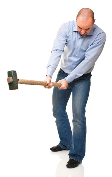 Mann mit Hammer im Einsatz — Stockfoto
