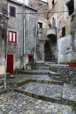 nice streetview of scalea ancient town in italy clipart