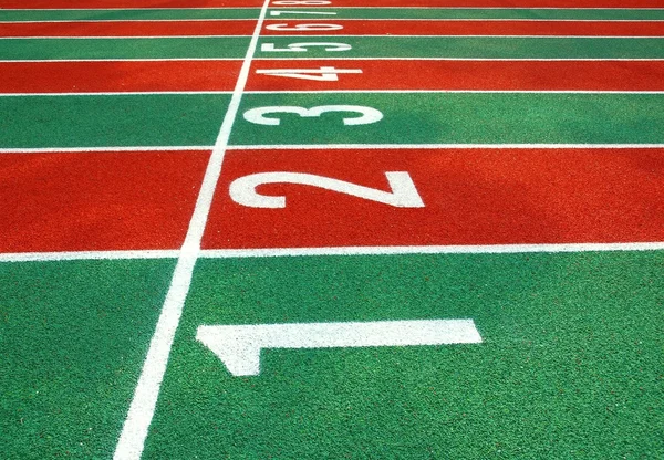 Línea de inicio de una pista de atletismo —  Fotos de Stock