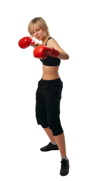 Fit girl in red boxing gloves — Stockfoto