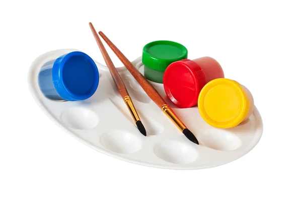 Palett, penslar och färg — Stockfoto