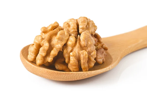 Walnuts in wooden spoon — Stock Photo, Image
