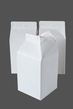 Three Milk Boxes per half liter on gray clipart