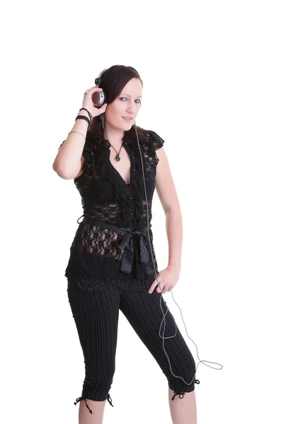 Fiatal nő zenehallgatás fejhallgató — Stock Fotó