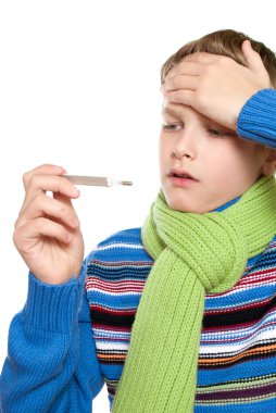 Adolescent temperature. The boy took it for its thermometer. clipart