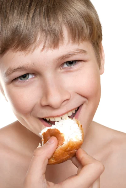 stock image Teen eats cake. The best dessert after a meal.