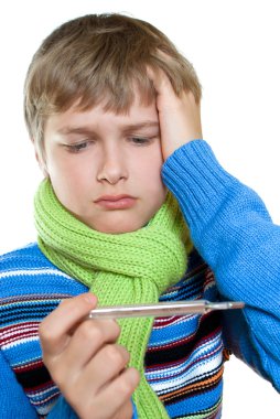 Adolescent temperature. The boy took it for its thermometer. clipart