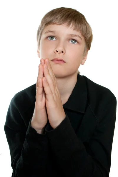 Nastolatka modli się do Boga. na białym tle. — Zdjęcie stockowe