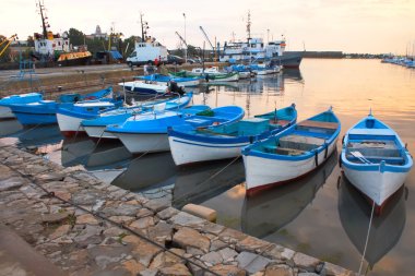 Boats near sea mooring clipart