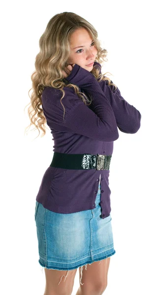 Meisje in een Lila shirt en spijkerbroek rok — Stockfoto