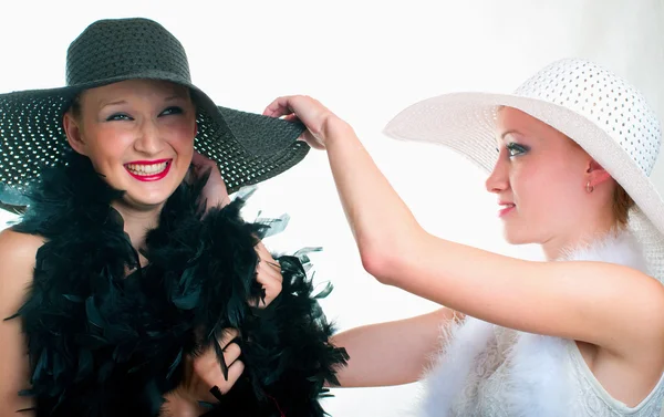Girls in hat and boa — Stock Photo, Image