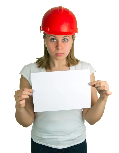 Women in a red building helmet holding a sheet of paper — Stock Photo, Image