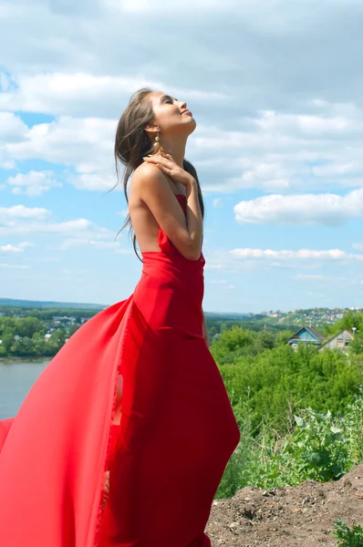 Beautiful girl in red dress — Stock Photo, Image