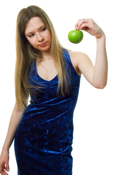 Girl in blue dress with a green apple — Stock Photo, Image