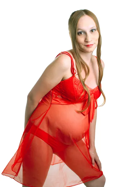 Těhotné ženy v červených šatech — Stock fotografie