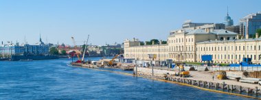 Construction on quay of the river Neva clipart