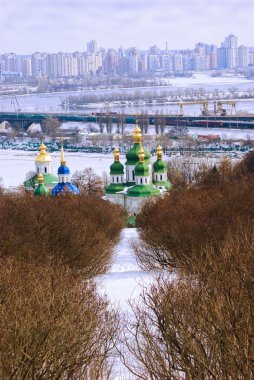 Kiev Botanic Garden. View to the Vydubichi monastery and left bank of Dnipro river clipart