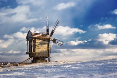 Old wooden windmills at Pirogovo ethnographic museum, near Kiev, Ukraine clipart