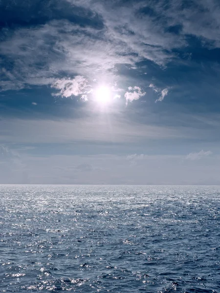 stock image Seascape with the sun and clouds