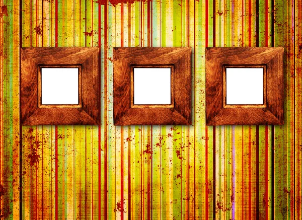 Três moldura de madeira na parede velha — Fotografia de Stock
